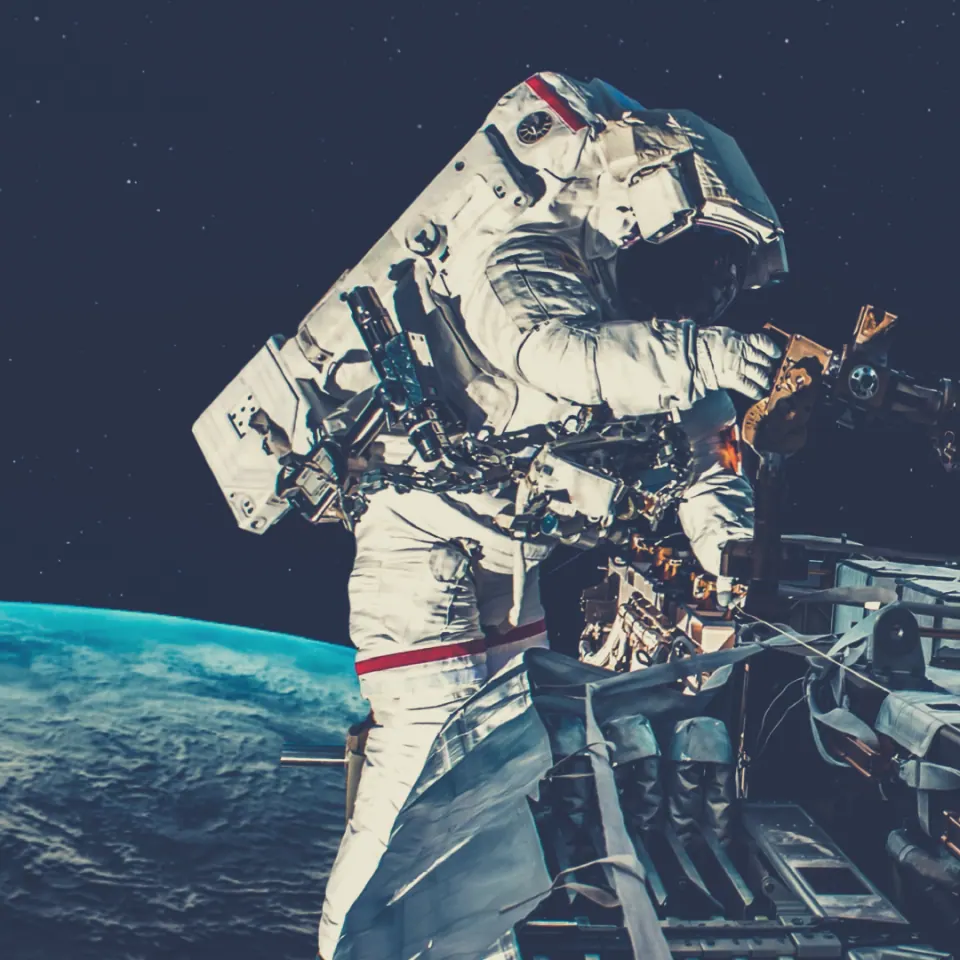 Astronaut against the backdrop of the Earth